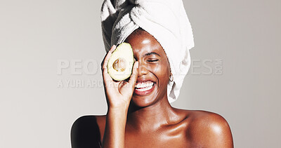 Buy stock photo Skincare, avocado and laugh with black woman in studio for natural cosmetics, beauty and funny. Omega 3 oil, antioxidants and self care with person on white background for hydration and happiness