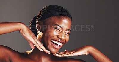 Buy stock photo Black woman, hands and face in studio for skincare in portrait, excited or results by background. African person, girl and smile for change with beauty, glow or cosmetics with mockup space in Nigeria