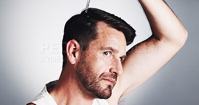 Buy stock photo Hair, serum and growth with man in studio for oil, self care and scalp health treatment. Beauty, alopecia routine and cosmetics with mature person and dropper on white background for glow or dandruff