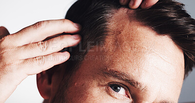 Buy stock photo Hairline, growth and closeup with man in studio for scalp inspection, beauty and alopecia treatment. Grooming, self care and dandruff with mature person on white background for clean and texture
