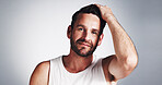 Portrait, skincare and man in studio, cosmetics and dermatology on grey background. Face, person and model with mockup space, grooming and shine with facial treatment, beauty and confidence with glow