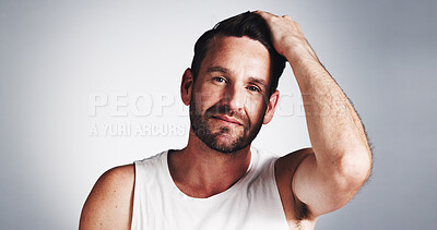 Buy stock photo Portrait, skincare and man in studio, cosmetics and dermatology on grey background. Face, person and model with mockup space, grooming and shine with facial treatment, beauty and confidence with glow