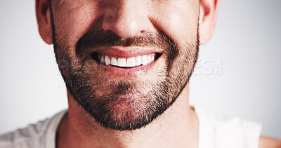 Buy stock photo Dentistry, mouth and smile of man in studio closeup for dental health, oral hygiene or teeth whitening. Aesthetic, beard and veneers implant with happy person on white background for tooth care