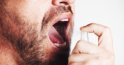 Buy stock photo Hands, spray and mouth for breath in studio with oral wellness, hygiene and results by white background. Person, bottle and fresh with product for self care, scent and routine for dental health