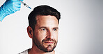 Scalp, needle and beauty with man in studio for prp injection, hair growth and aesthetic treatment. Collagen benefits, anti aging and cosmetics with mature person and hand on white background