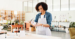 Workshop, woman and inspection with cup for pottery, small business and notes for stock management. Ceramic store, female person and potter with checklist for writing, order and mug as product