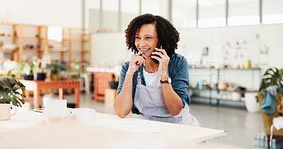 Buy stock photo Phone call, thinking and woman in workshop for pottery inventory, sculpture idea or order clay supply. Ceramic art, happy person and talking with technology for insight, planning and creative craft