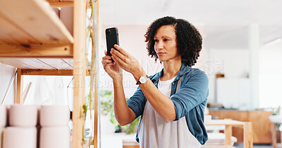 Buy stock photo Studio, woman and photography with phone for pottery, creative sculpture or potter for blog post. Workshop, female person or clay artist with mobile for artwork picture, ceramic shelf or social media