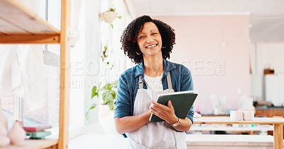 Buy stock photo Woman, tablet and smile at pottery workshop with pride for career with sculpture, portrait and job at studio. Person, digital touchscreen and manager with app, creativity or ceramic store in Colombia