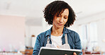 Woman, reading and tablet at pottery workshop for stock, inventory management and clay orders. Person, digital and craft checklist for pricing update, account invoice and production of ceramic supply