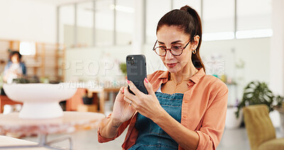 Buy stock photo Pottery, woman and phone with picture in studio for social media, creative website and sculpture lesson memory. Workshop, smartphone and person with photo for ceramic, clay pot and art for online app