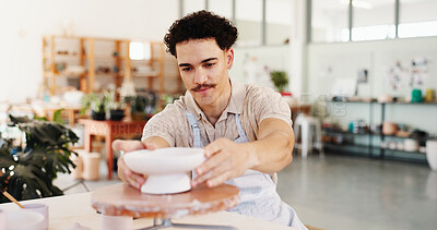 Buy stock photo Man, ceramics and manufacturing at pottery workshop with skill for career with sculpture, art or job at studio. Person, process and talent for craft with design, clay product or creativity at store