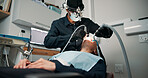 Checkup, medical procedure and patient with dentist in office for appointment or mouth operation. Dentistry, healthcare or oral exam with medicine professional and woman at clinic for dental hygiene