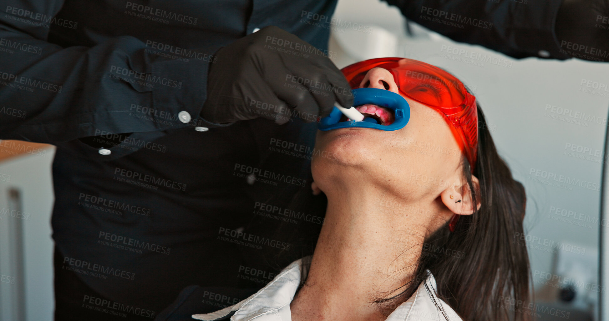 Buy stock photo Appointment, hands and mouth of patient with dentist in office for checkup, cleaning or operation. Dental hygiene, filling or visor with medicine professional and woman at clinic for healthcare