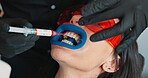 Cleaning, medical and patient in visor with dentist in office for checkup or mouth operation. Dental hygienist, healthcare or oral exam with medicine professional and woman at clinic for dentistry