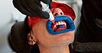 Appointment, medical or tooth cleaning with patient at dentist for checkup or mouth operation. Dental hygiene, healthcare or oral procedure with medicine professional and woman closeup at clinic