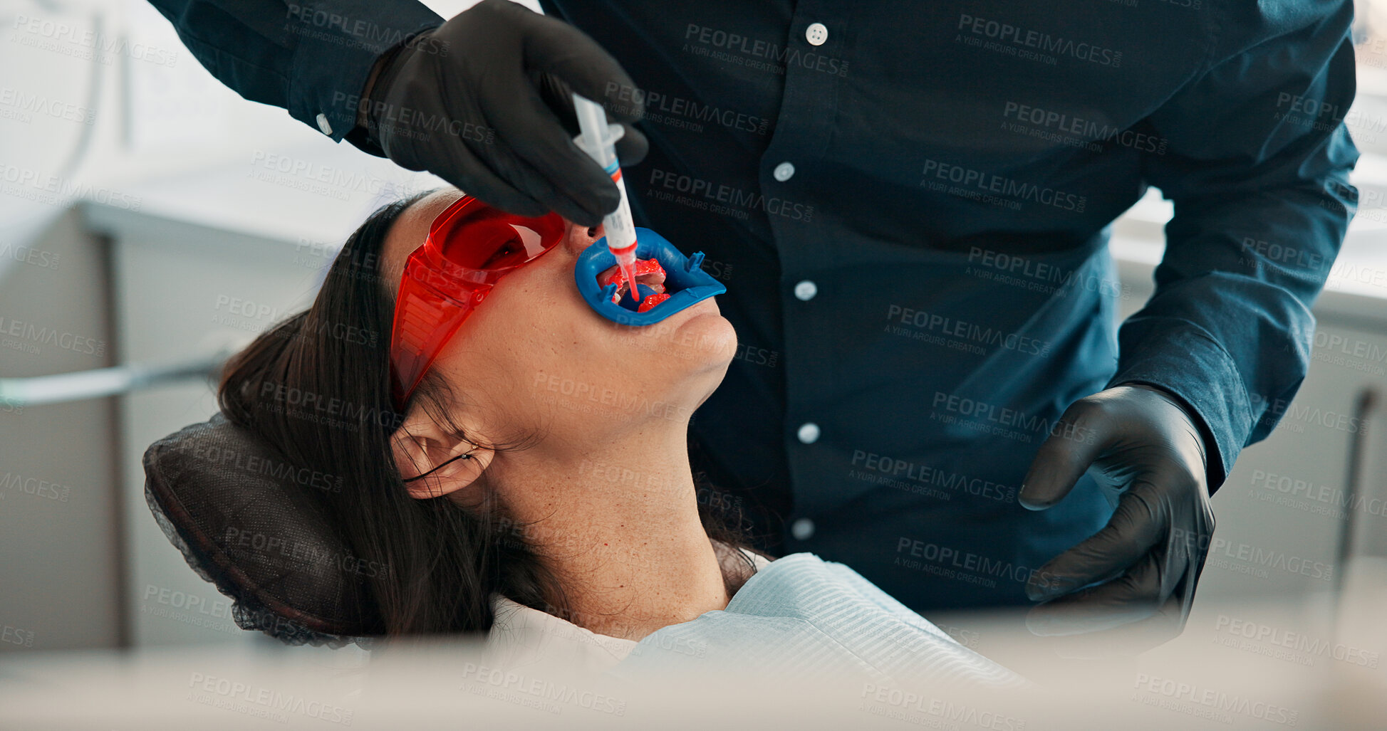 Buy stock photo Cleaning, hands and visor on patient with dentist in office for checkup or mouth operation. Dental health, hygiene or oral exam with medicine professional and woman at clinic for dentistry procedure