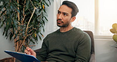 Buy stock photo Waiting room, thinking and man with clipboard for writing information, insurance form and medical history. Healthcare, hospital and person with checklist for wellness, appointment and consultation