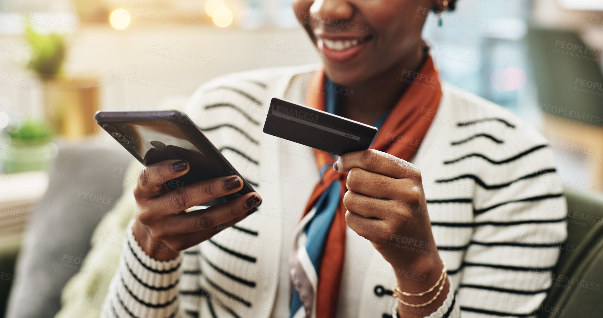 Buy stock photo Home, credit card and black woman with smartphone, hands and online shopping with smile. African person, closeup and cellphone with debit transactions, banking and internet with payment and deal