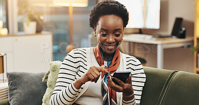 Buy stock photo Black woman, happy or relax with phone on sofa for streaming subscription, social media scroll or reading ebook. Smile, person or internet connection in home for dating site profile or contact search