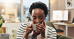Black woman, relax and coffee aroma in home to start morning, warm scent and caffeine satisfaction. Smile, person and smell hot beverage on sofa with nostalgia, thinking or weekend break in apartment
