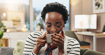 Buy stock photo Black woman, relax and coffee aroma in home to start morning, warm scent and caffeine satisfaction. Smile, person and smell hot beverage on sofa with nostalgia, thinking or weekend break in apartment