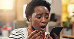 Home, surprise and black woman with smartphone, wow and email notification with online news report. Mobile user, apartment or African person with cellphone, shocked and article on war or human rights