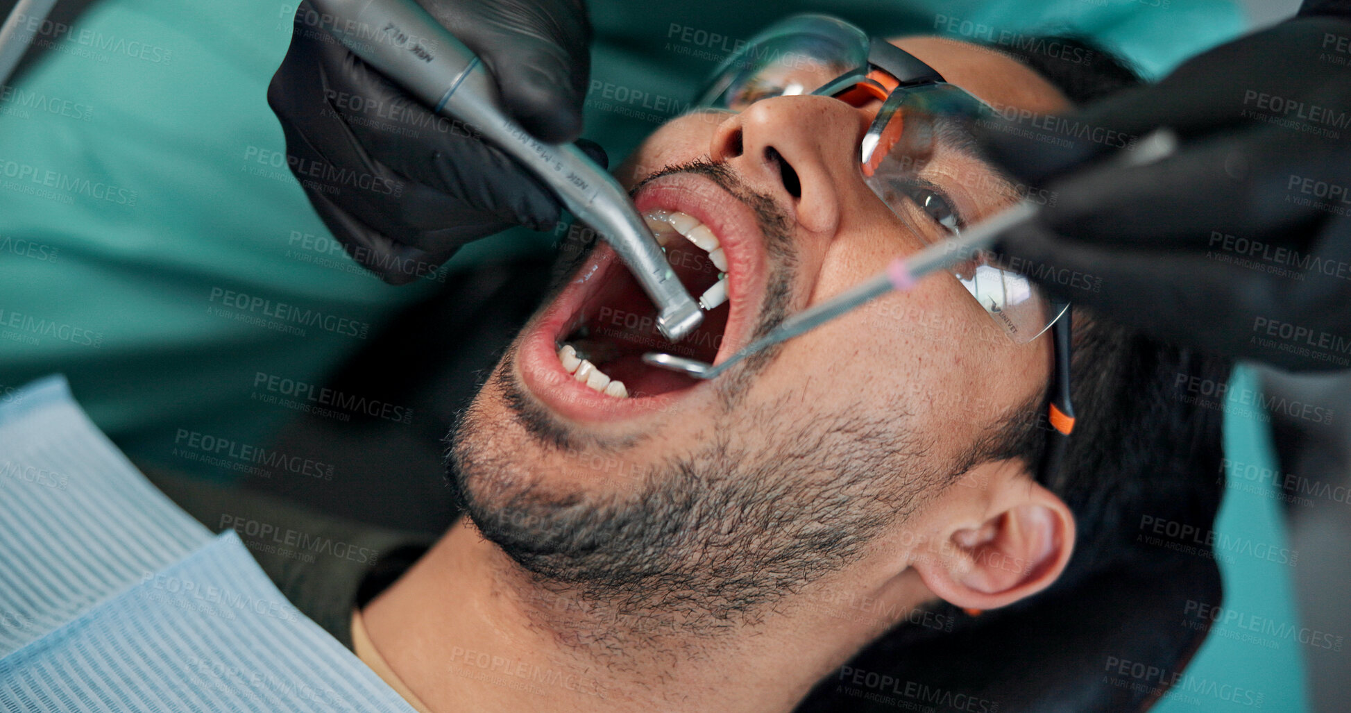 Buy stock photo Man, hands or dentist with drill or mirror for dental care, hygiene or cleaning mouth at orthodontist. Closeup, male person or patient with surgeon or scaler for tooth extraction or removal at clinic