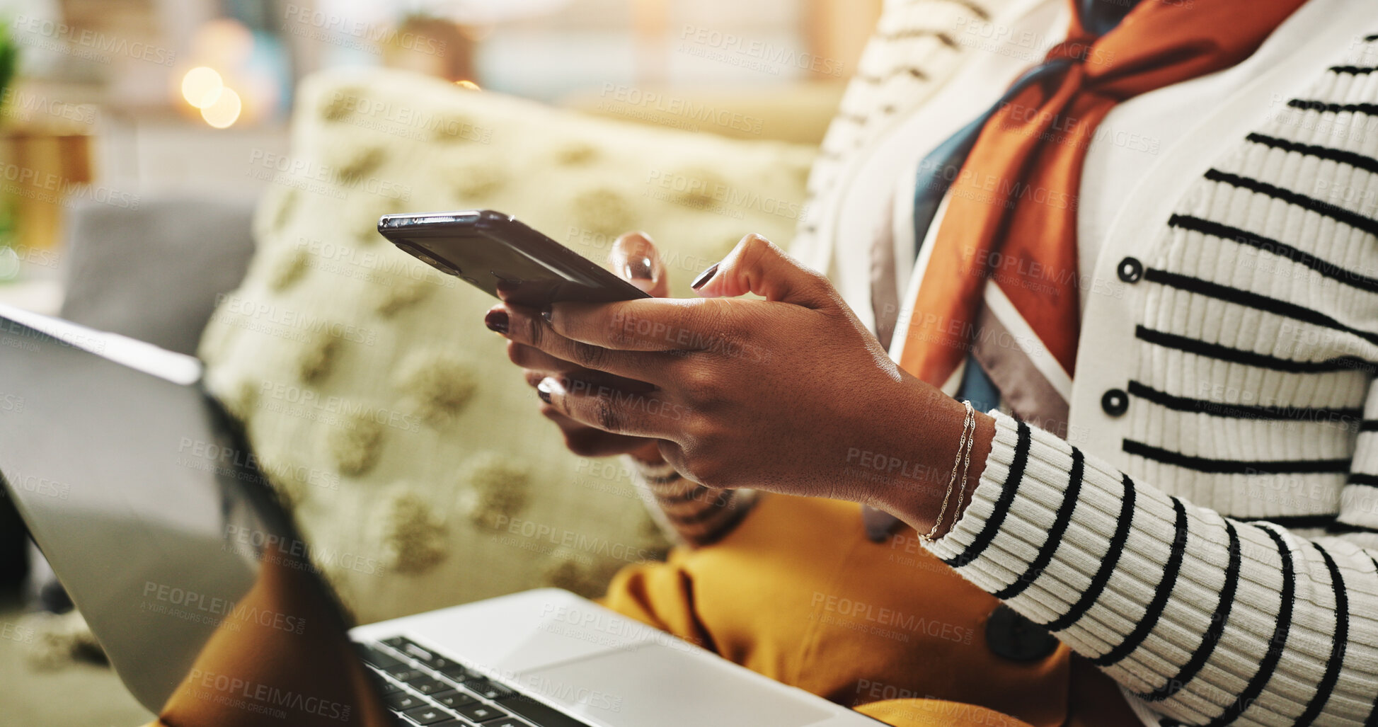 Buy stock photo Woman, hands and typing with phone on sofa for social media, communication or research at home. Closeup, female person or user with mobile smartphone or laptop for online texting, chatting or app