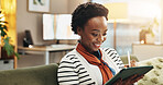 Pen, tablet and black woman in home for remote work, blog or ghostwriter writing article. Sofa, freelancer and technology with happy author reading email, research story or editing publication online