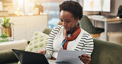 Buy stock photo Laptop, document and black woman in home for hybrid work, finance and accounting. Computer, reading and freelancer on sofa with paperwork for audit, payroll information and bookkeeping with taxes