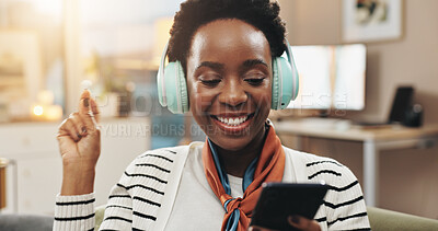 Buy stock photo Phone, black woman and dancing with headphones in home for music playlist, audio album and streaming subscription. Dancer, happy and smartphone for social media video and listening to podcast on sofa