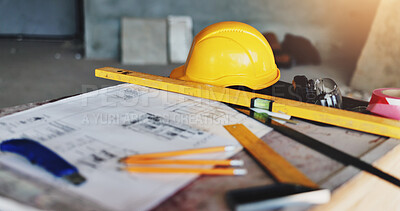 Buy stock photo Architecture, blueprint and drawing tools with hard hat for industrial renovation, building design and planning. Safety equipment, scale and floor plan at construction site for project development
