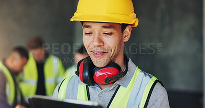 Buy stock photo Building, hardhat and tablet with construction worker man on site for civil engineering or development. App, earmuffs and planning with happy developer person on location for project management