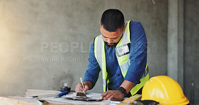 Buy stock photo Man, construction worker and writing with clipboard, renovation and notes for safety report at site. Person, engineer and architect with checklist, inspection and space with property development