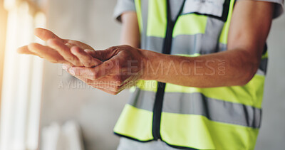 Buy stock photo Hands, construction worker and pain with carpal tunnel for renovation project, arthritis or injury at site. Person, engineer and builder with burnout, muscle fatigue or tired with massage for relief
