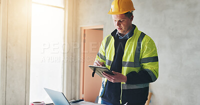 Buy stock photo Building, blueprint and tablet with construction worker man in office for civil engineering or development. App, laptop and planning with property developer person on site for project management