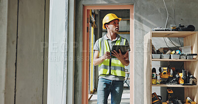 Buy stock photo Building, tablet and walking with construction worker man on site for civil engineering or development. Checklist, inspection and planning with developer person on location for project management