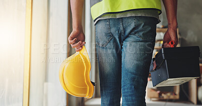 Buy stock photo Construction, hands and walking with toolbox, helmet and safety compliance for industrial development. Contractor, person and tools on site for building maintenance, renovation project and inspection
