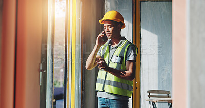 Buy stock photo Man, phone call and discussion at construction site for renovation by window, insight or negotiation for material price. Person, architecture and smartphone for talk, property or development project
