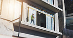 Construction site, engineer and man on balcony, building and inspection of process with tablet or online. City, inspector and person with tech for architecture, project management and renovation