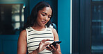 Deadline, night and phone with business woman in office for communication, text message or update. App, search and social media with employee at work in late evening for chatting or networking