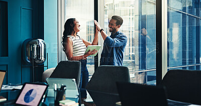 Buy stock photo Happy, colleagues and high five in office, tablet and celebration for marketing strategy or success. Business, man and woman with smile for achievement, gesture and people with tech for project