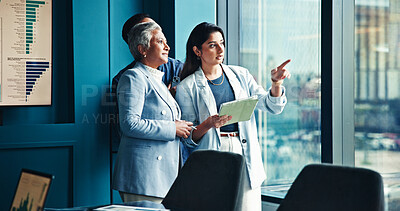 Buy stock photo Pointing, tablet and business people in office, conversation and charts for property development. Group, cooperation and employees in workplace, tech and advisor for real estate, communication or app
