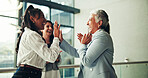 Women, happy and high five with group at office with support, achievement and praise at agency. People, celebration and cheers with goals, winning and team with congratulations at insurance company