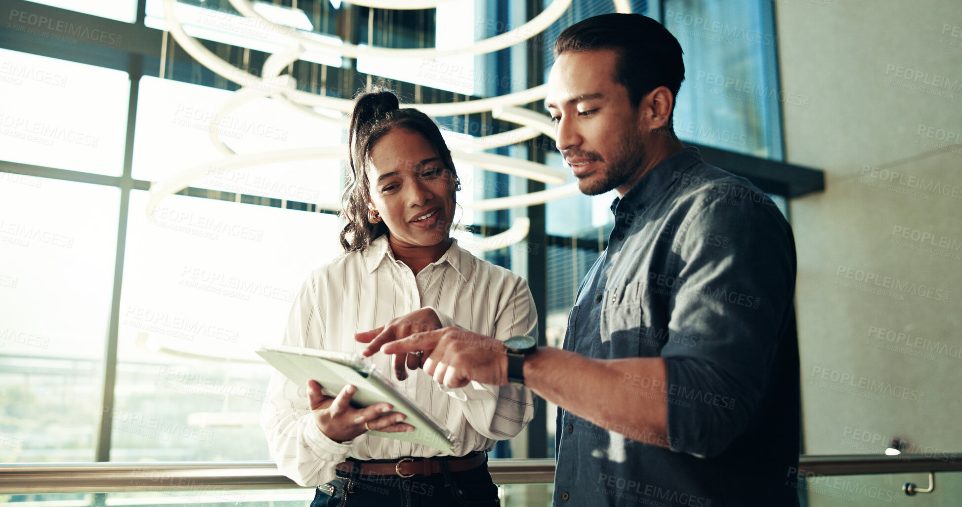 Buy stock photo Office, online and people with tablet, discussion and colleagues with ideas on web and collaboration. Pointing, man and woman with tech for project, teamwork and planning for ad campaign in business
