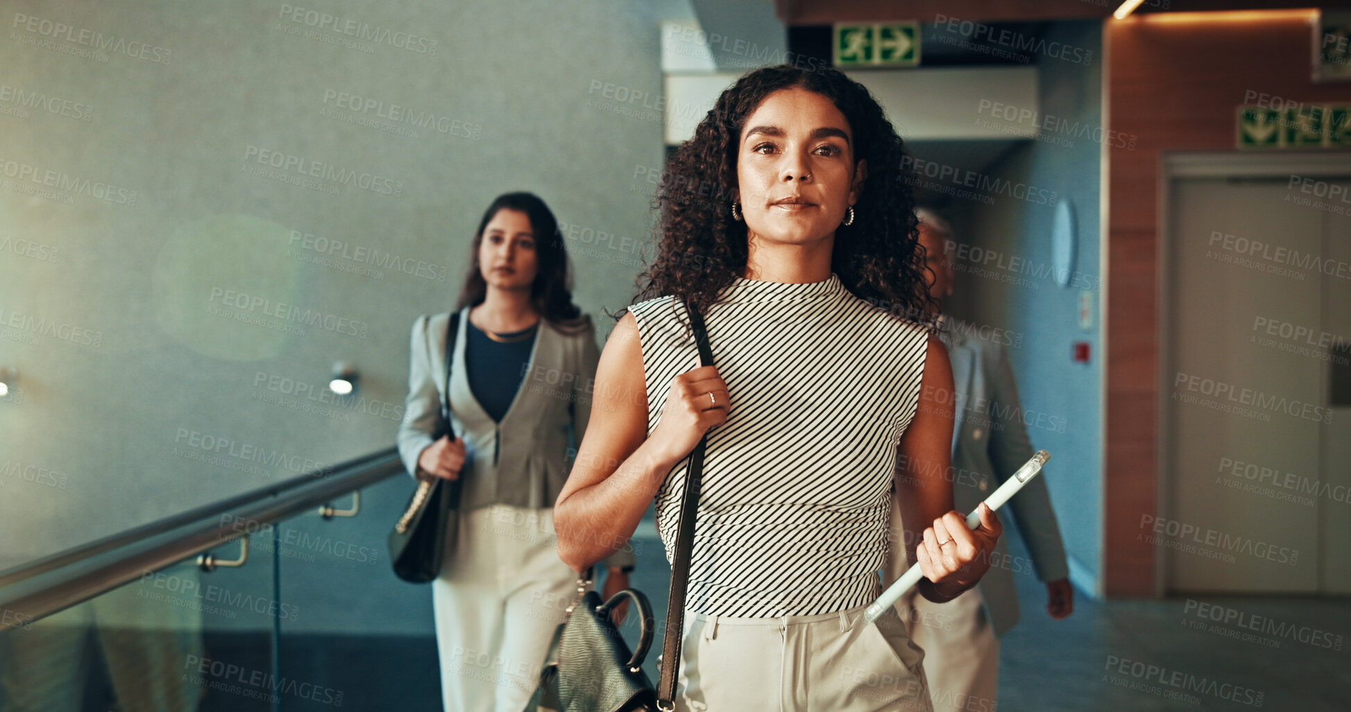 Buy stock photo Serious, walking and business woman in office with tablet for appointment, project deadline or meeting. People, proud fashion designer or female employees in workplace lobby with creative opportunity