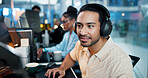 Office, businessman and headphones with computer for coding, web development and listening to music. Coworking, night and male programmer with technology for programming, software update and podcast