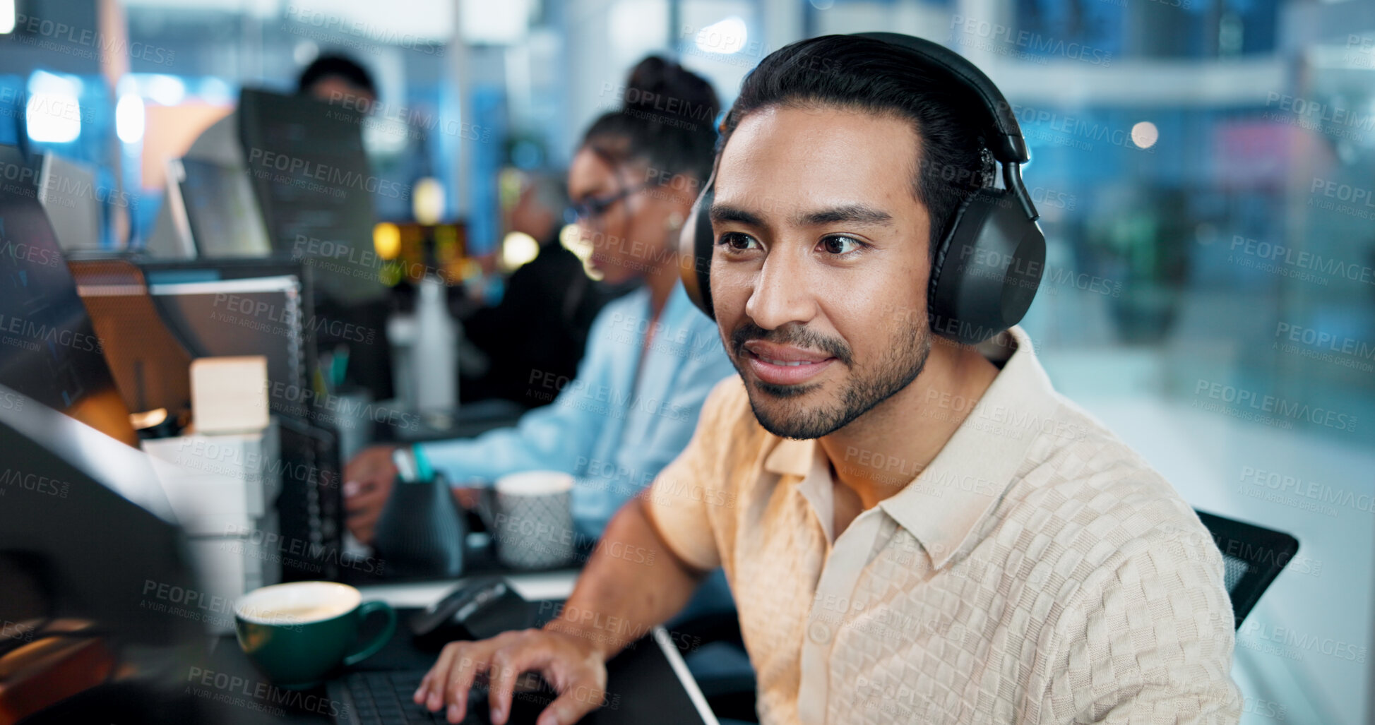 Buy stock photo Office, businessman and headphones with computer for coding, web development and listening to music. Coworking, night and male programmer with technology for programming, software update and podcast