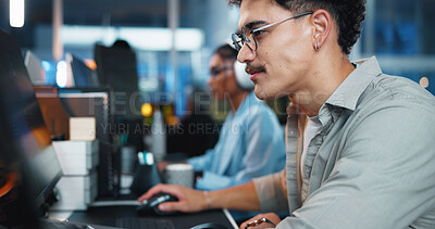 Buy stock photo Office, businessman and reading with computer for coding, web development and scroll on website. Coworking, night and male programmer with technology for programming, software update and information